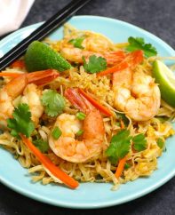 Authentic Pad Thai served on a plate with chopsticks
