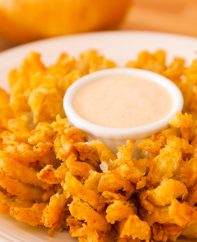 This mouthwatering Blooming Onion is crispy on the outside and tender on the inside, rivalling that of Outback Steakhouse. I will share with you the secrets to make this most impressive-looking appetizer and you will make it again and again… Plus video recipe tutorial! #bloomingOnion