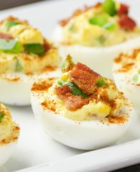 These Deviled Eggs with Bacon are the perfect appetizer for parties and holidays, featuring a smooth and creamy filling with crispy bacon on top. So good!