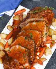 Eye of round roast made in the slow cooker with homemade gravy drizzled on top