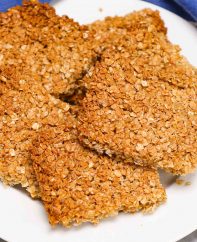 Traditional British Flapjacks are delicious bars of oats and golden syrup, baked until they’re lightly brown. Flapjacks are similar to granola bars and are made with simple, wholesome ingredients you probably already have on hand.
