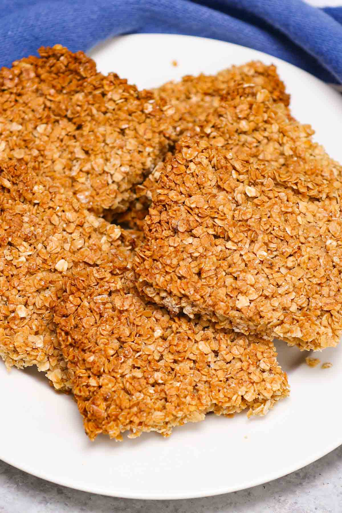 Traditional British Flapjacks are delicious bars of oats and golden syrup, baked until they’re lightly brown. Flapjacks are similar to granola bars and are made with simple, wholesome ingredients you probably already have on hand.