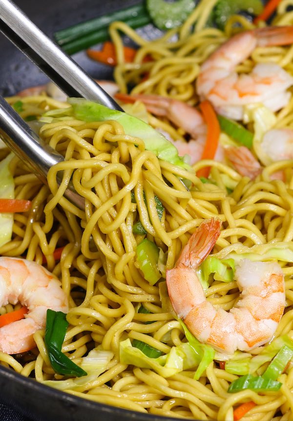 This Garlic Shrimp Lo Mein is loaded with succulent shrimp, fresh vegetables and lo mein noodles. It comes together in about 20 minutes and is so much better than takeout. Simple, fast and delicious!