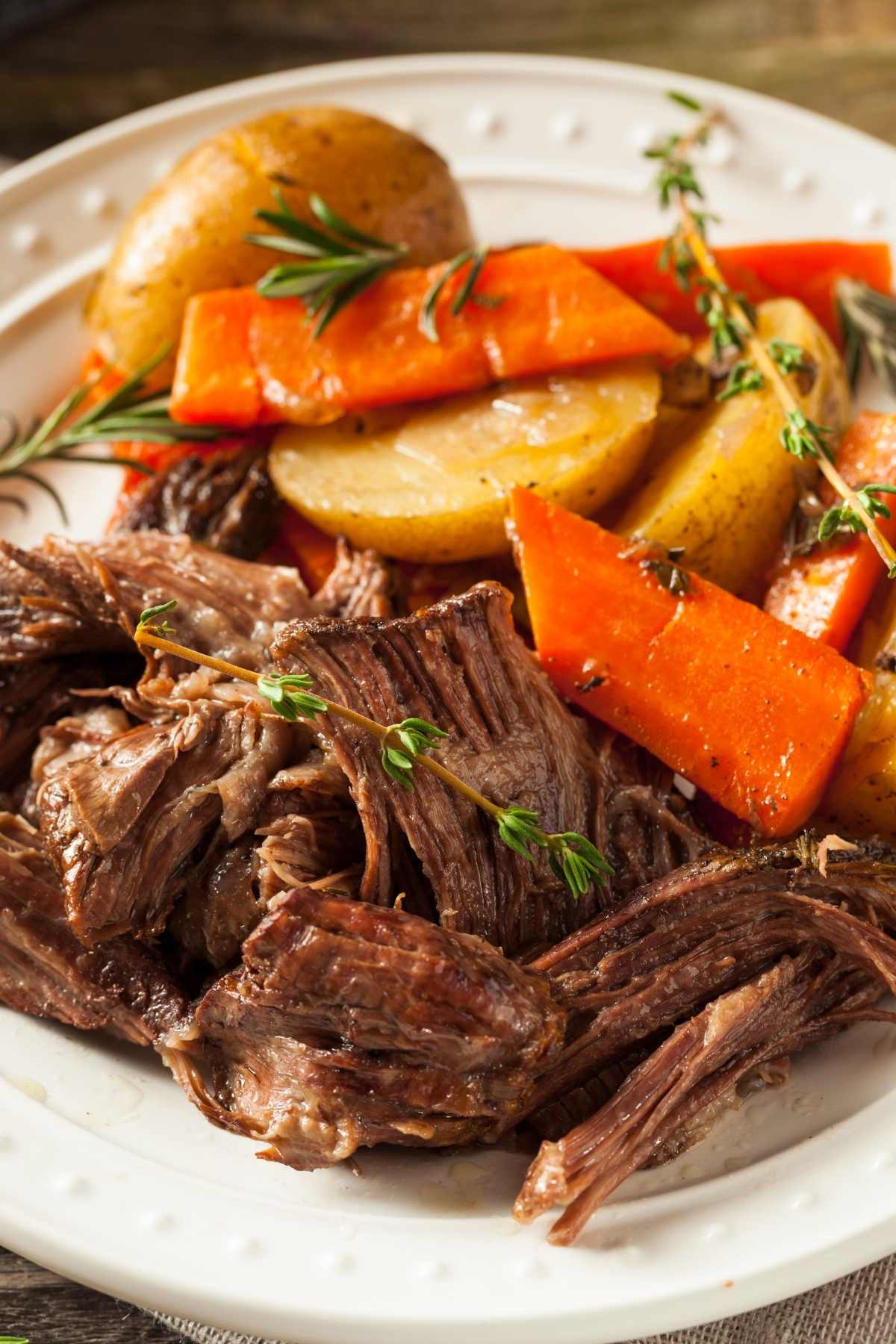Serving of Crock pot chuck roast on a plate