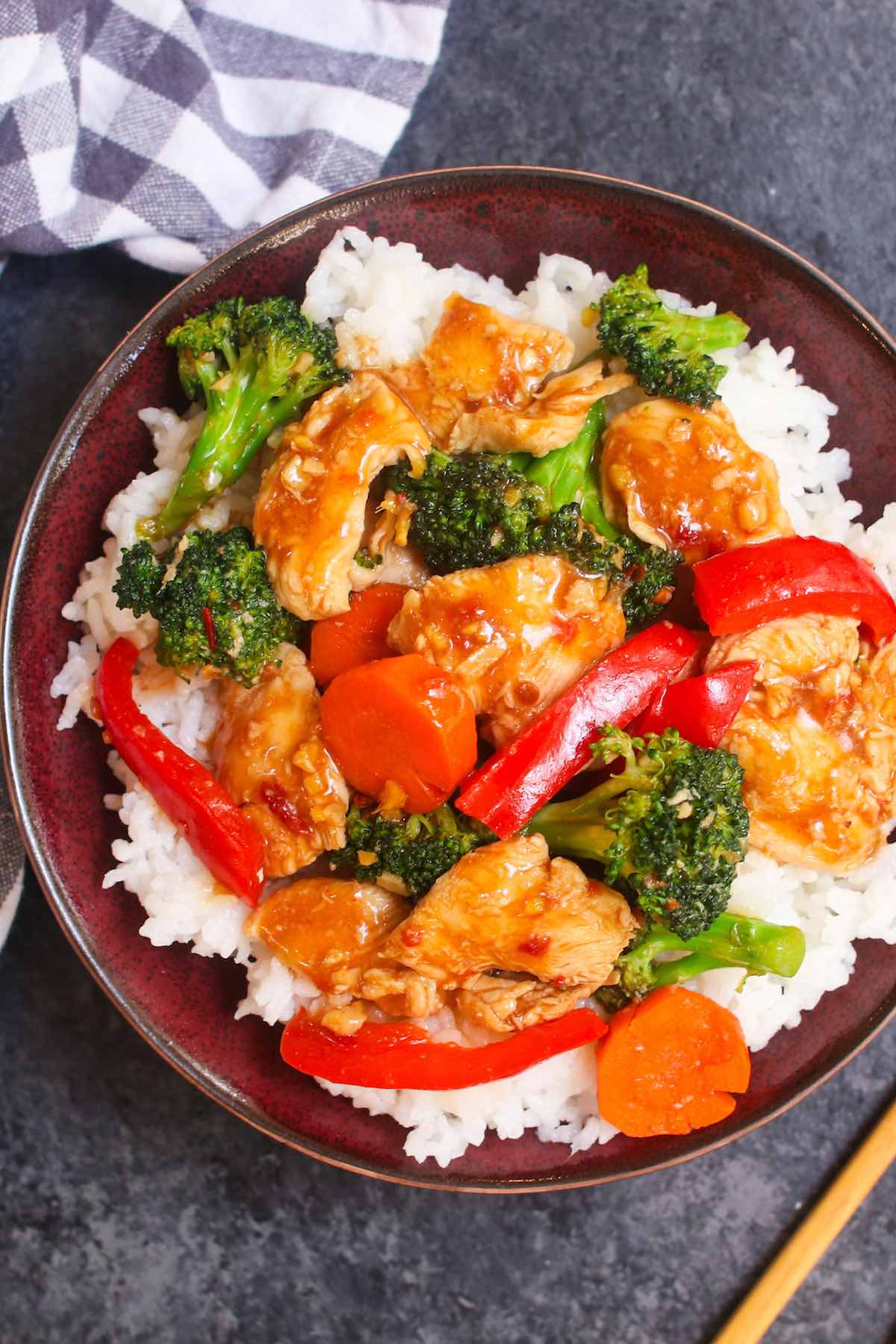 Hunan Chicken is a spicy stir-fry dish with sliced chicken breast and mixed vegetables in a delicious Hunan sauce. The spicy chili bean paste lends a wonderful salty and spicy flavor to this quick and easy recipe that rivals authentic Chinese takeout.