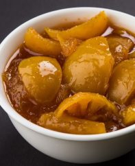 Indian lime pickle served in a small bowl as a condiment