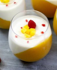 The Best Mango Panna Cotta – looks so elegant and tastes so delicious that you won’t believe how easy it is to make! Creamy, rich and smooth dessert topped with fresh mango and raspberries. All you need is some simple ingredients: fresh mango, mango juice, gelatin, milk, heavy cream and vanilla extract. Wow your guest with this refreshing dessert at your next party! No bake, easy dessert. Video recipe.