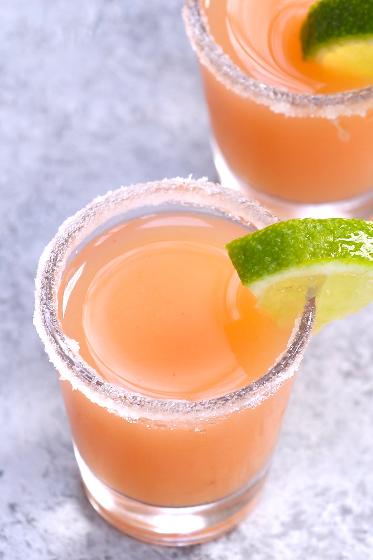Closeup of a Mexican Lollipop Candy Shot with a wedge of lime