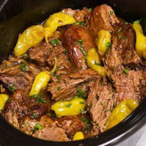 Mississippi Pot Roast is a fork-tender chuck roast that’s full of flavor! This no-fuss “dump and go” pot roast recipe is made with 5 ingredients in a crockpot with only 10 minutes of prep!