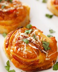 These Pizza Rolls are my favorite Italian appetizer that’s loaded with pepperoni and cheese rolled in pizza dough. Baked to perfection in the oven and you can serve these mini rolls with pizza sauce for the easy last-minute snack!