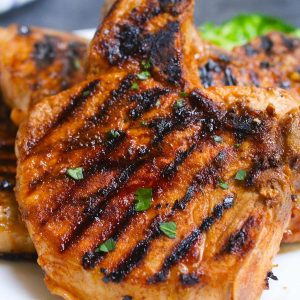 The Best Ever Pork Chop Marinade produces tender and flavorful pork chops every time! It’s an easy pork marinade recipe made with soy sauce, brown sugar, vinegar, garlic, olive oil, and ketchup. You can use the marinated pork chops for grilling, pan frying, or baking.