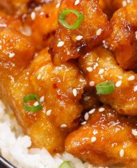 Sticky and crispy Easy Sesame Chicken made fast and simple, with the most delicious sweet and savory sesame chicken sauce. This easy Chinese recipe takes less than 30 minutes to make and is so much better than takeout! Tender skinless chicken thighs coated with crispy batter and swimming in the most flavorful homemade sticky sesame chicken sauce, you’re just minutes away from the most addictive Chinese Sesame Chicken that will become your family favorite! It’s the perfect dinner to have when you feel like eating something sweet with a hint of savory.
