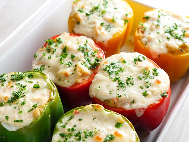 Stuffed Bell Peppers make a colorful side dish for a holiday feast or any lunch or dinner - these ones are made with Creamy Chicken Noodle soup mixed with breadcrumbs and parmesan for a delicious filling