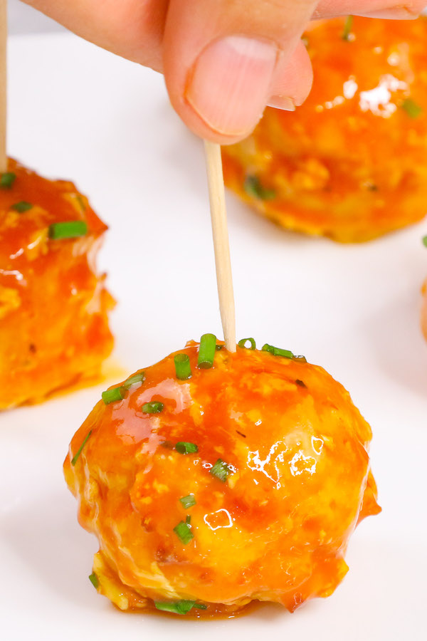 These Turkey Meatballs are tender and juicy, smothered in the delicious tomato sauce, completely melt in your mouth!  It’s full of flavor and great for a quick weeknight meal or appetizers for a party! #TurkeyMeatballs