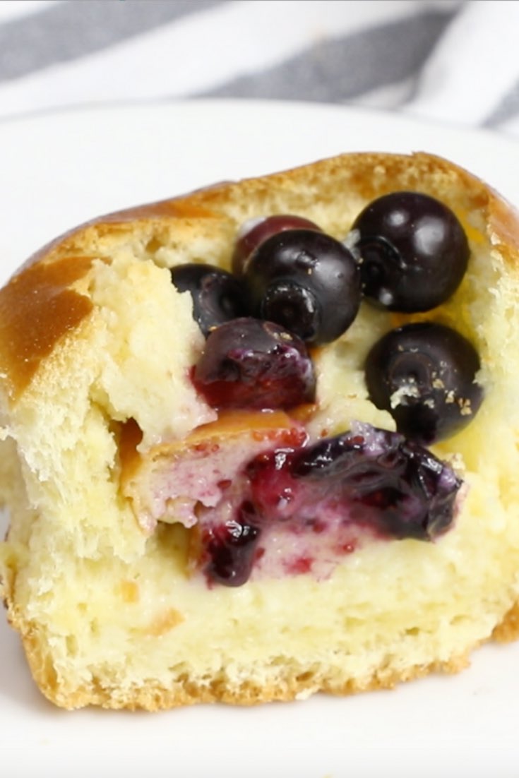 Blueberry Cheesecake Bread Pudding Pull Aparts – Soft and fluffy dinner rolls or Hawaiian sweet rolls filled with delectable blueberry cheesecake. The easiest and best bread pudding that can be pulled apart! Only 7 simple ingredients needed for this delicious treat: Dinner rolls, blueberry, cream cheese, sugar, egg, vanilla extract and milk. Serve warm out of the oven for breakfast, brunch or dessert. So good! Quick and easy, party food, party dessert. Great for Mother’s Day Brunch. Video recipe. | Tipbuzz.com